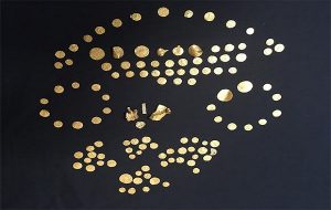 Large Hoard of 1,400-Year-Old Gold Coins Unearthed in England