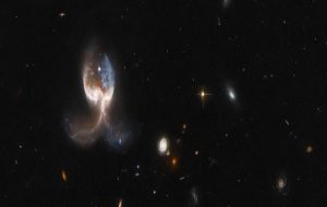 This Terrifying Space Angel Is Actually a Merger of Two Colossal Cosmic Objects