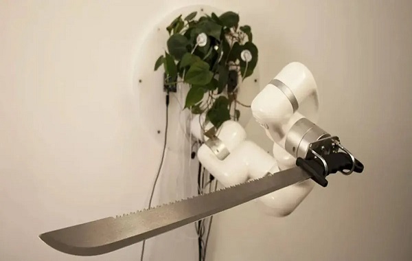 This machete is controlled by a plant yielding a robot arm