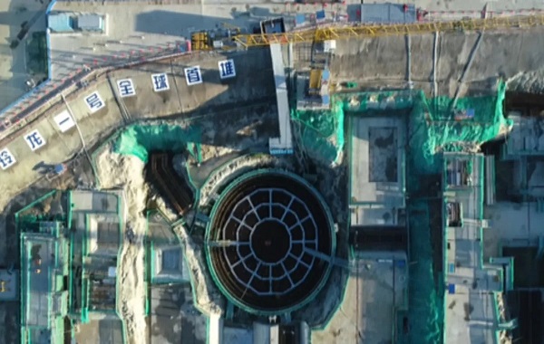 China s planned nuclear island is taking shape with the installation of its first reactor