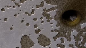 Marsın Güney Kutbunun Neden Delikli Peynire Benzediği Ortaya Çıkarıldı