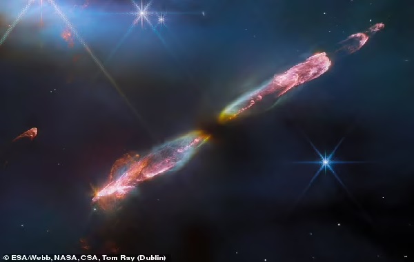 NASA's James Webb snaps a stunning photo of a rainbow 'lightsaber' shooting out of a newborn sun-like star