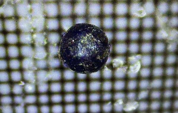 Mysterious metal spheres discovered at the bottom of the ocean are simply industrial pollutants – and NOT alien-made, study claims 