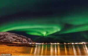 Northern Lights to shine across parts of the UK TONIGHT as a huge solar storm strikes Earth: Is your area going to be illuminated as Aurora Borealis lights up the night sky?