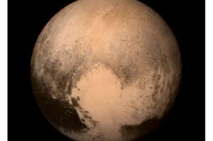 The Ocean Beneath Pluto Could Liquid Water Exist on a Frozen World