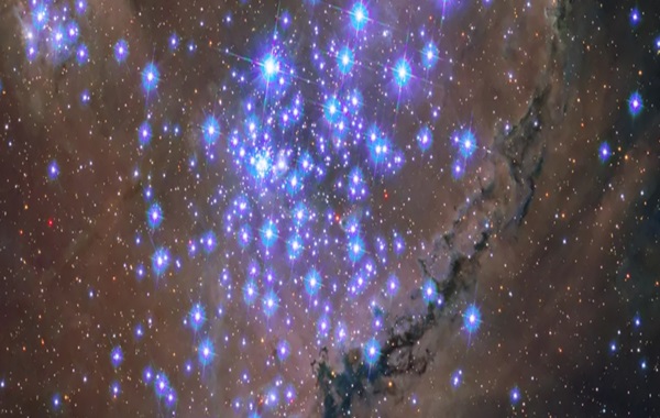 NASA Reveals Incredible Image of Star Cluster Shining in Ultraviolet