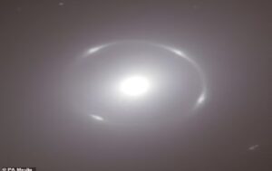 Scientists are AMAZED to discover a stunning 'Einstein Ring' hiding in our cosmic backyard