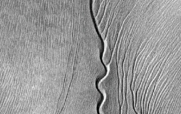 Aliens or water? Scientists reveal mystery of how wormlike gullies formed on Mars